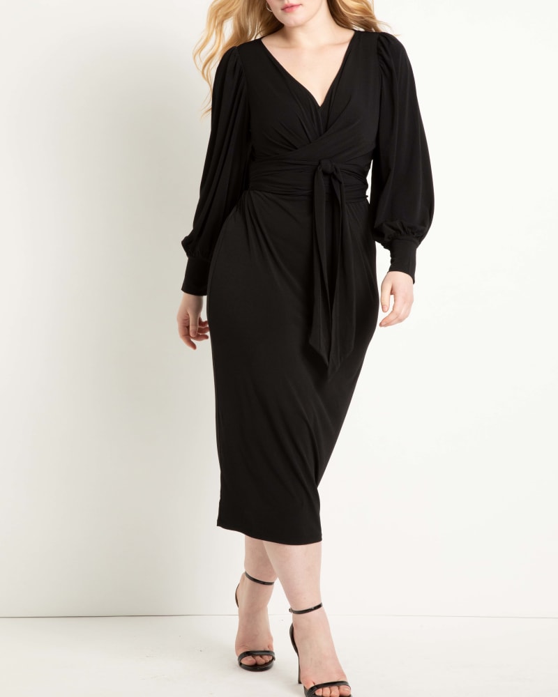 Front of a model wearing a size 22 Cross Front Midi Dress in Totally Black by ELOQUII. | dia_product_style_image_id:295137
